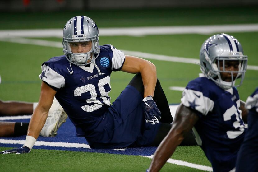 Cowboys strong safety Jeff Heath (38) stretches during practice at Ford Center at The Star...