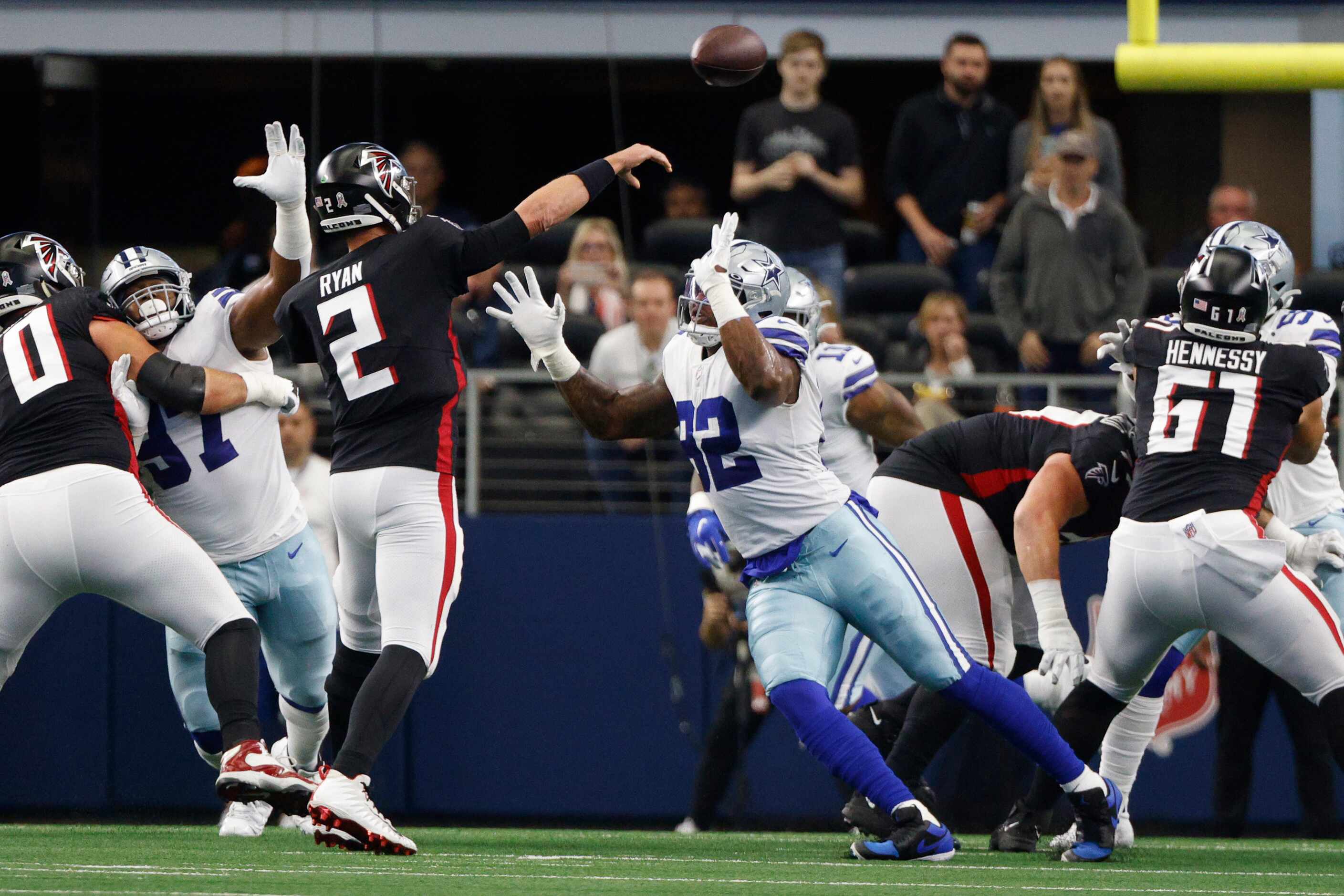 Dallas Cowboys defensive end Dorance Armstrong (92) pressures Atlanta Falcons quarterback...