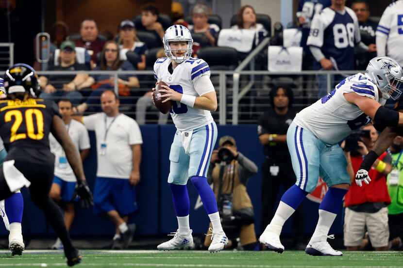 Dallas Cowboys quarterback Cooper Rush (10) in action during an NFL football game against...