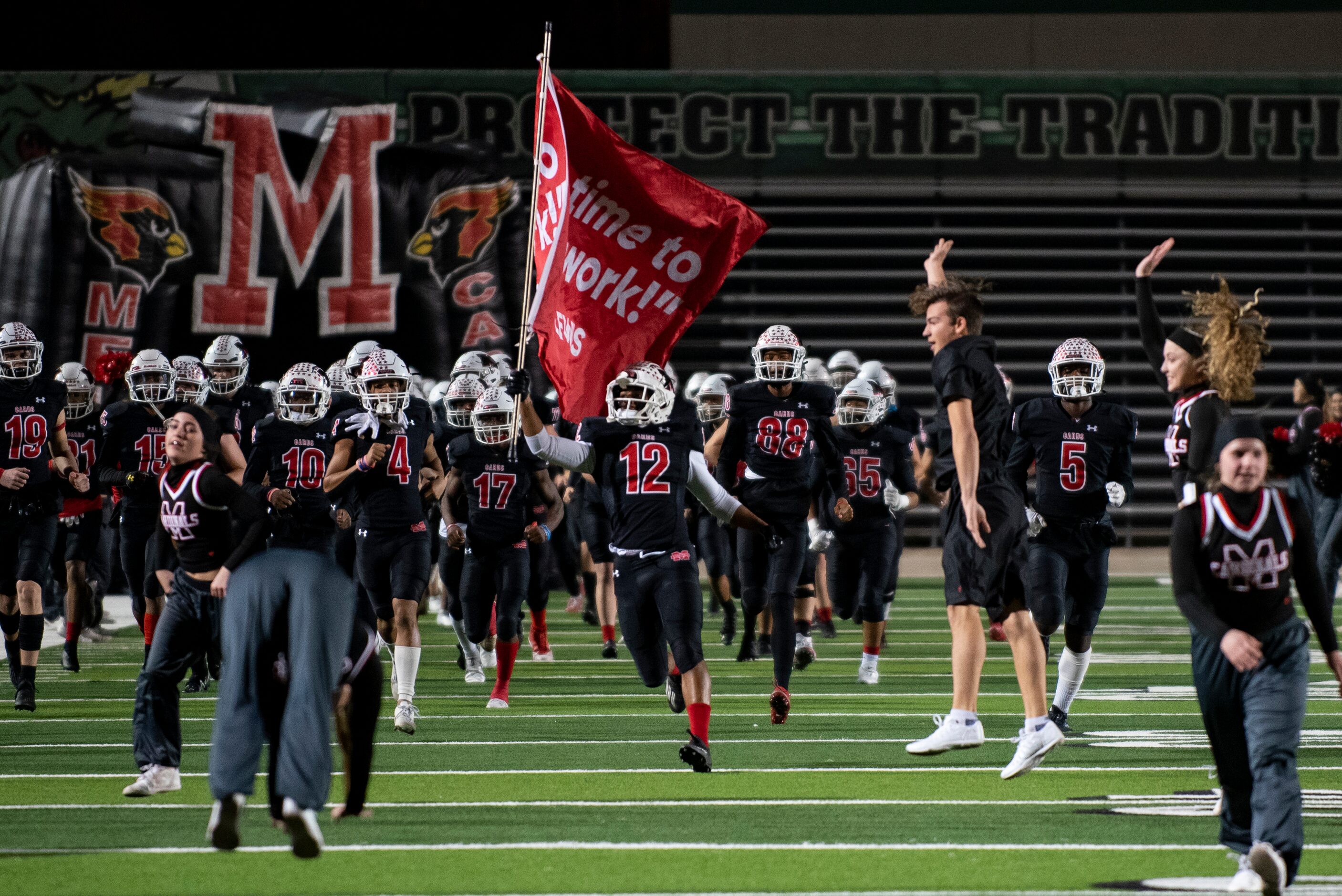 The Melissa Cardinals take the field prior to the start of the Class 4A Division I...