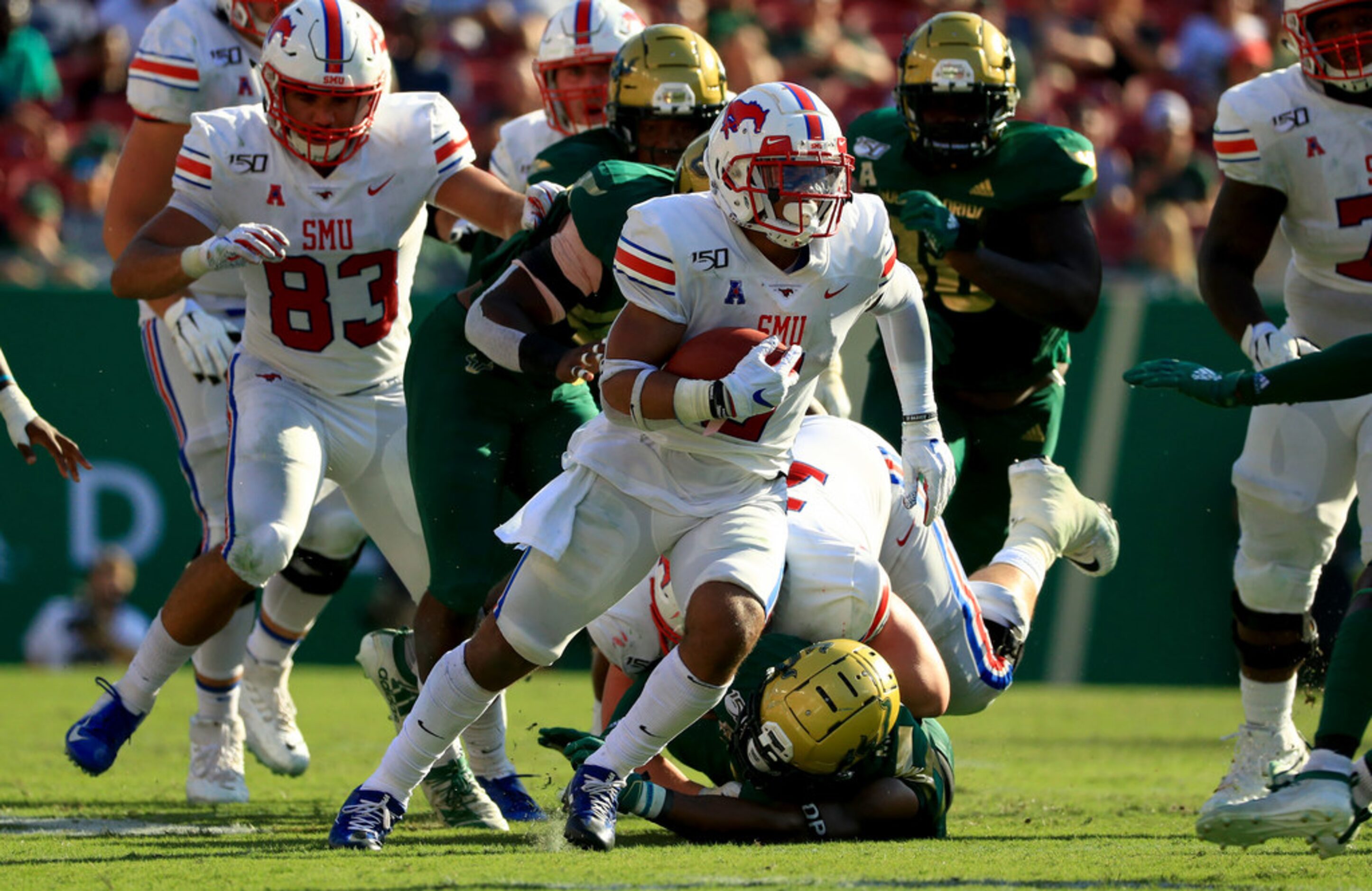 TAMPA, FLORIDA - SEPTEMBER 28: Xavier Jones #5 of the Southern Methodist Mustangs rushes...