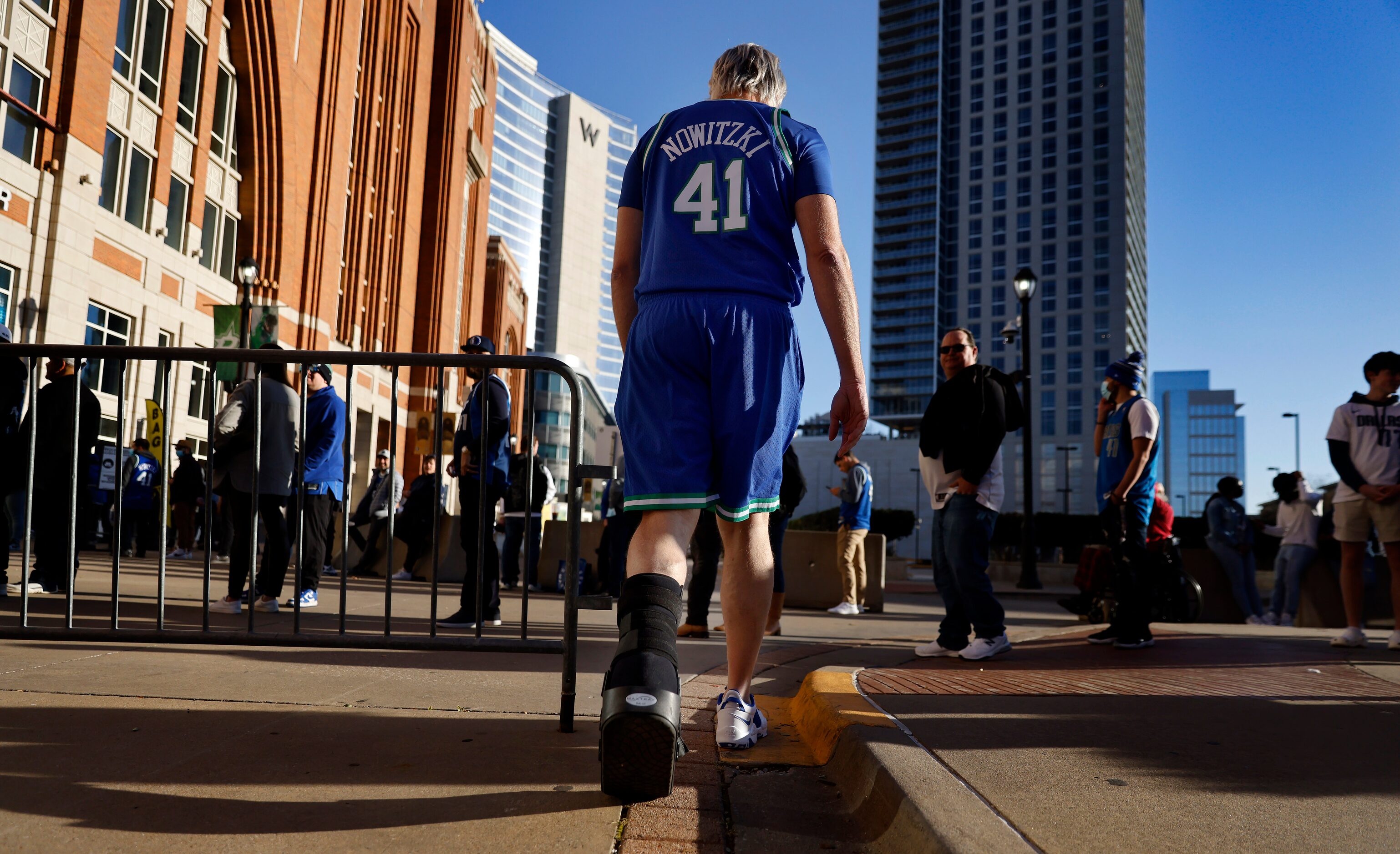 Fan Ben Stewart of Tyler dressed as former Dallas Mavericks All-Star Dirk Nowitzki as he...