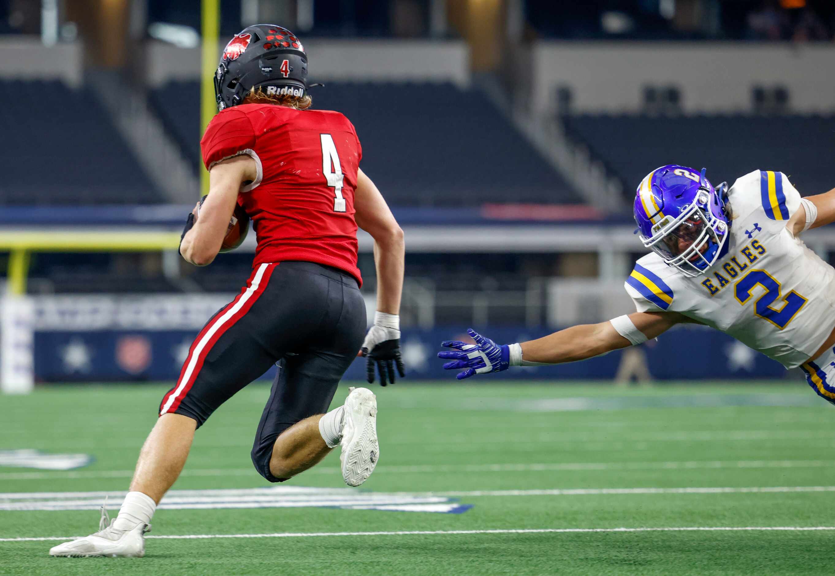 during the first quarter of their Class 3A Division I state championship game AT&T Stadium...