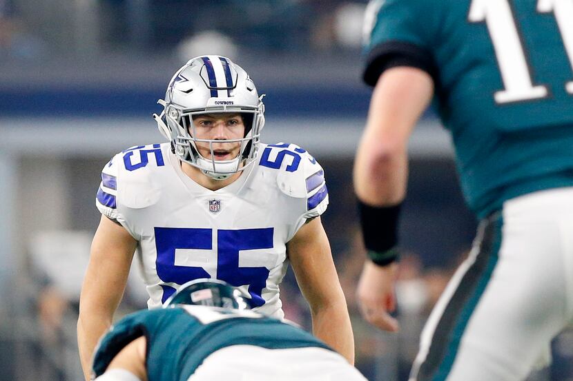 Dallas Cowboys outside linebacker Leighton Vander Esch (55) eyes Philadelphia Eagles...