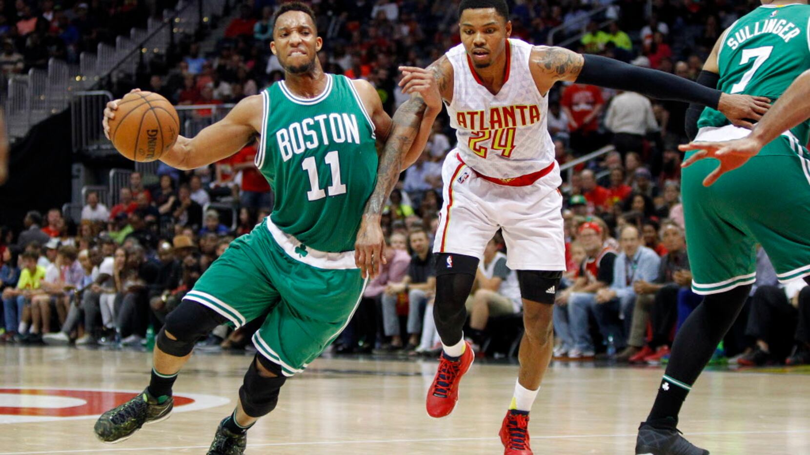 Apr 26, 2016; Atlanta, GA, USA; Boston Celtics guard Evan Turner (11) is defended by Atlanta...