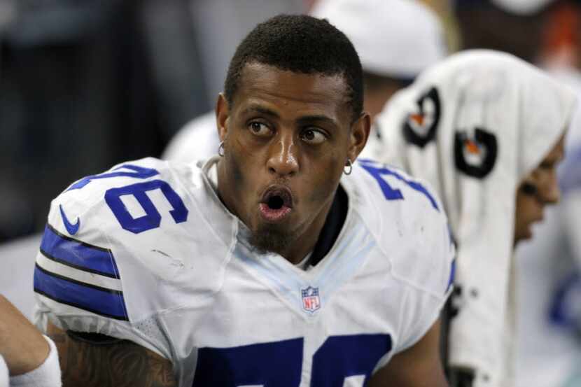 FILE - In this Aug. 29, 2015, file photo, Dallas Cowboys defensive end Greg Hardy (76) talks...