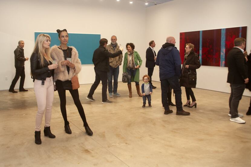 Guests at the opening of the exhibition White Noise, at 214 Projects, the new Dallas Art...