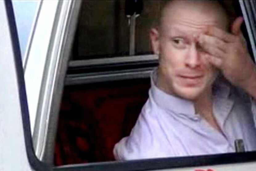 
Sgt. Bowe Bergdahl, shown in a vehicle guarded by the Taliban in eastern Afghanistan, has...
