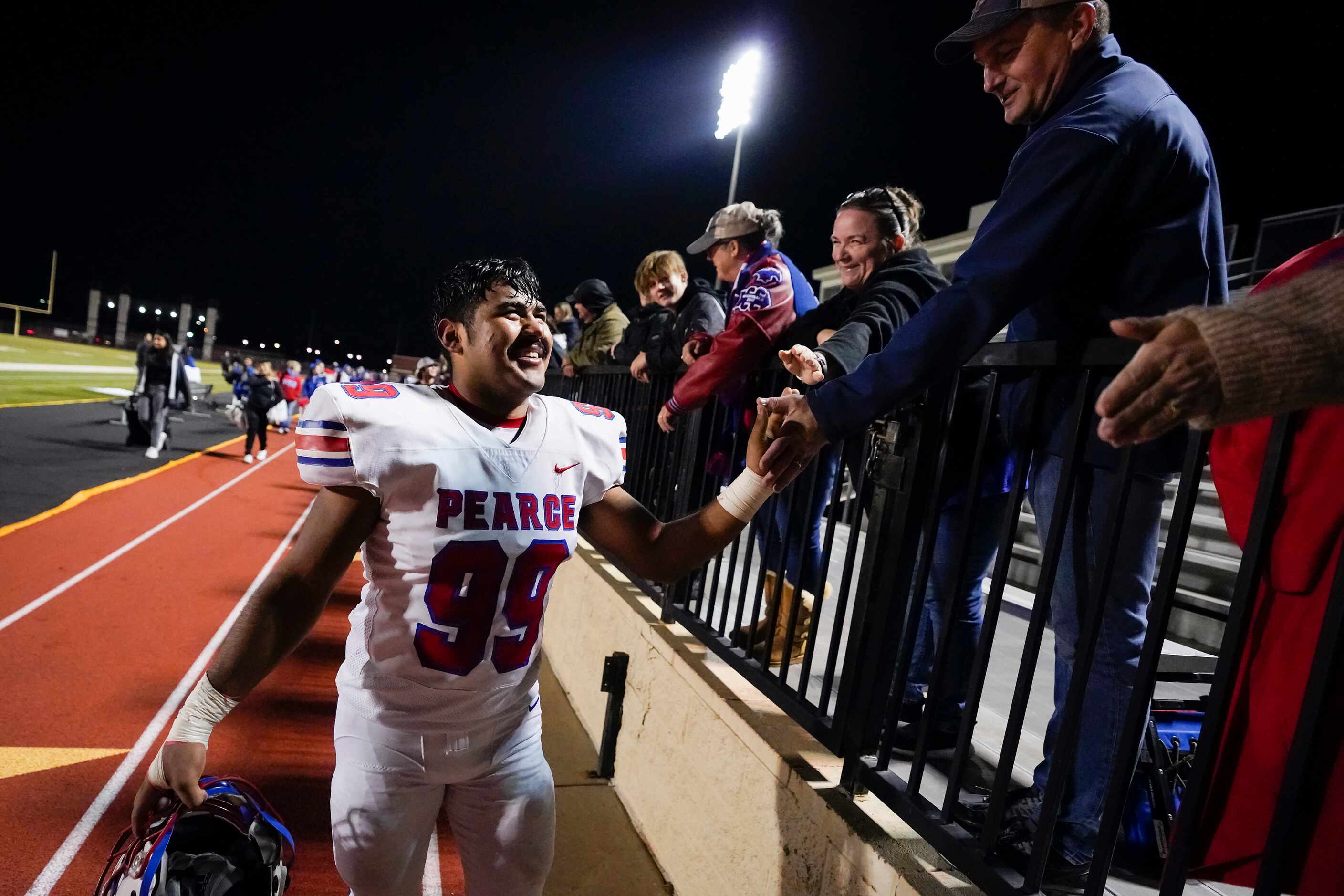 Richardson JJ Pearce defensive lineman Rodolfo Ramirez (99) celebrates with fans after a...