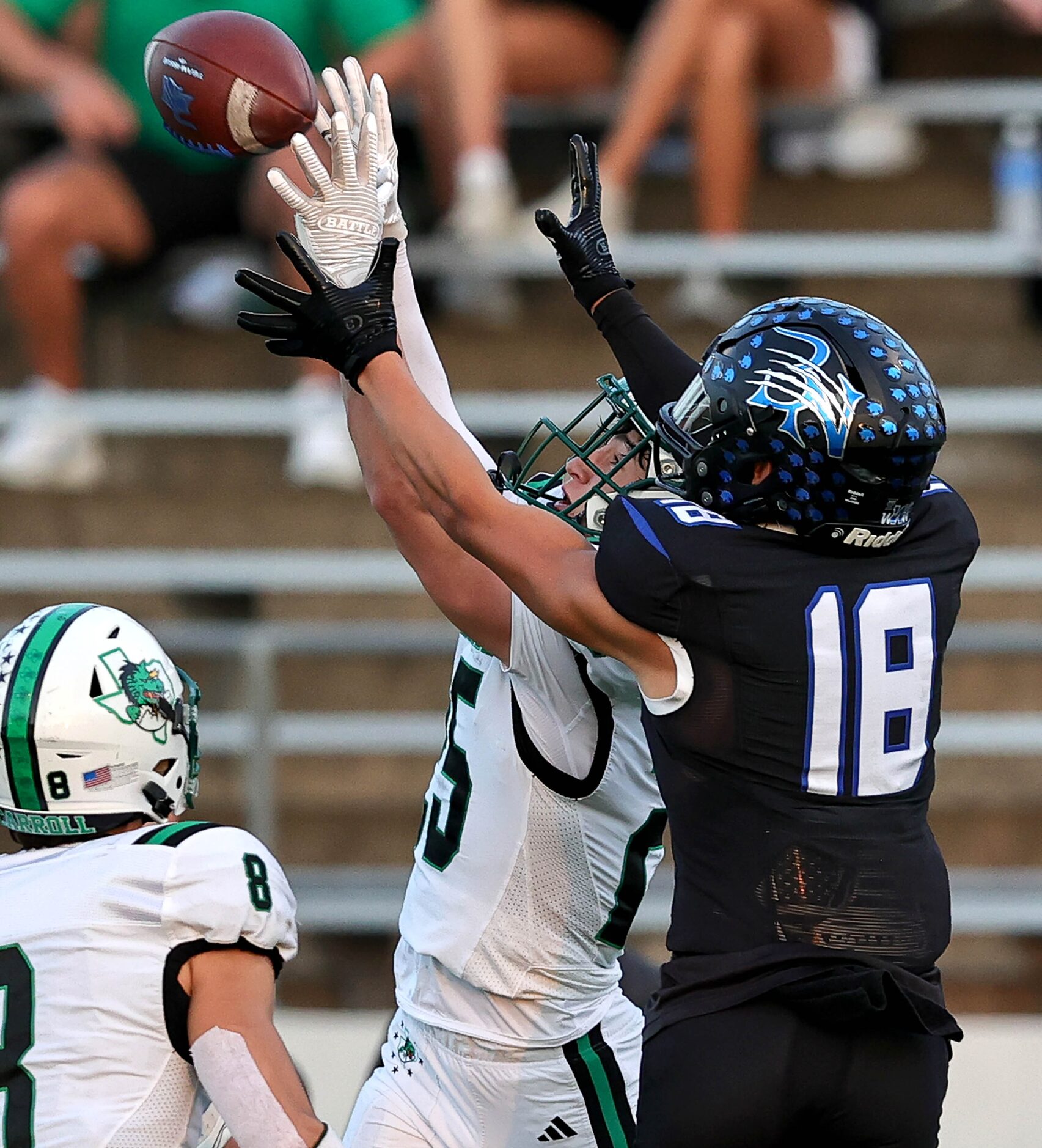 Southlake Carroll defensive back Sam Fuller (25) grabs an interception against Byron Nelson...