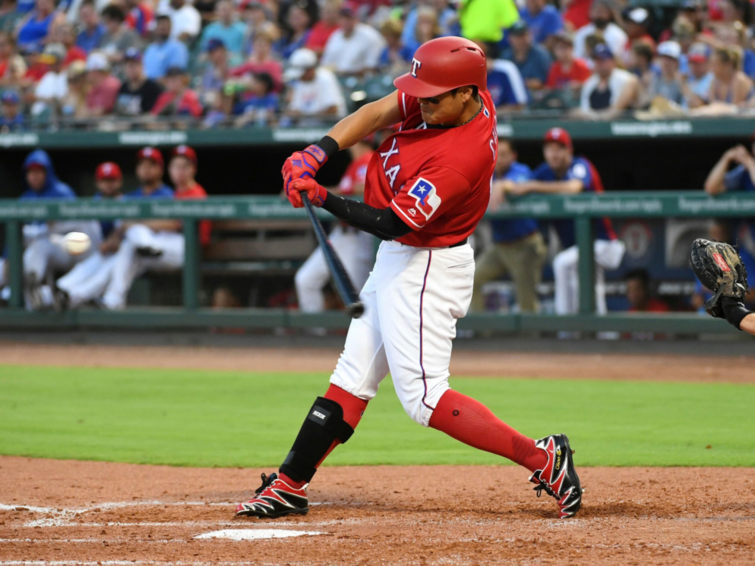 Texas Rangers' Shin-Soo Choo connects on a two-run home run off Chicago White Sox relief...