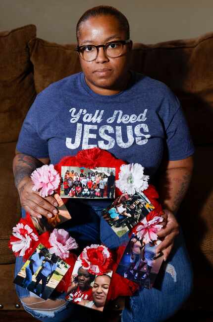 Courtney Williams with a wreath of photos of her niece, Brionne.