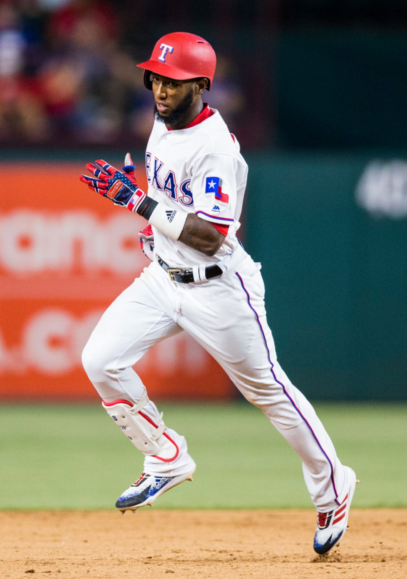 Texas Rangers shortstop Jurickson Profar (19) runs the bases after hitting a home run during...