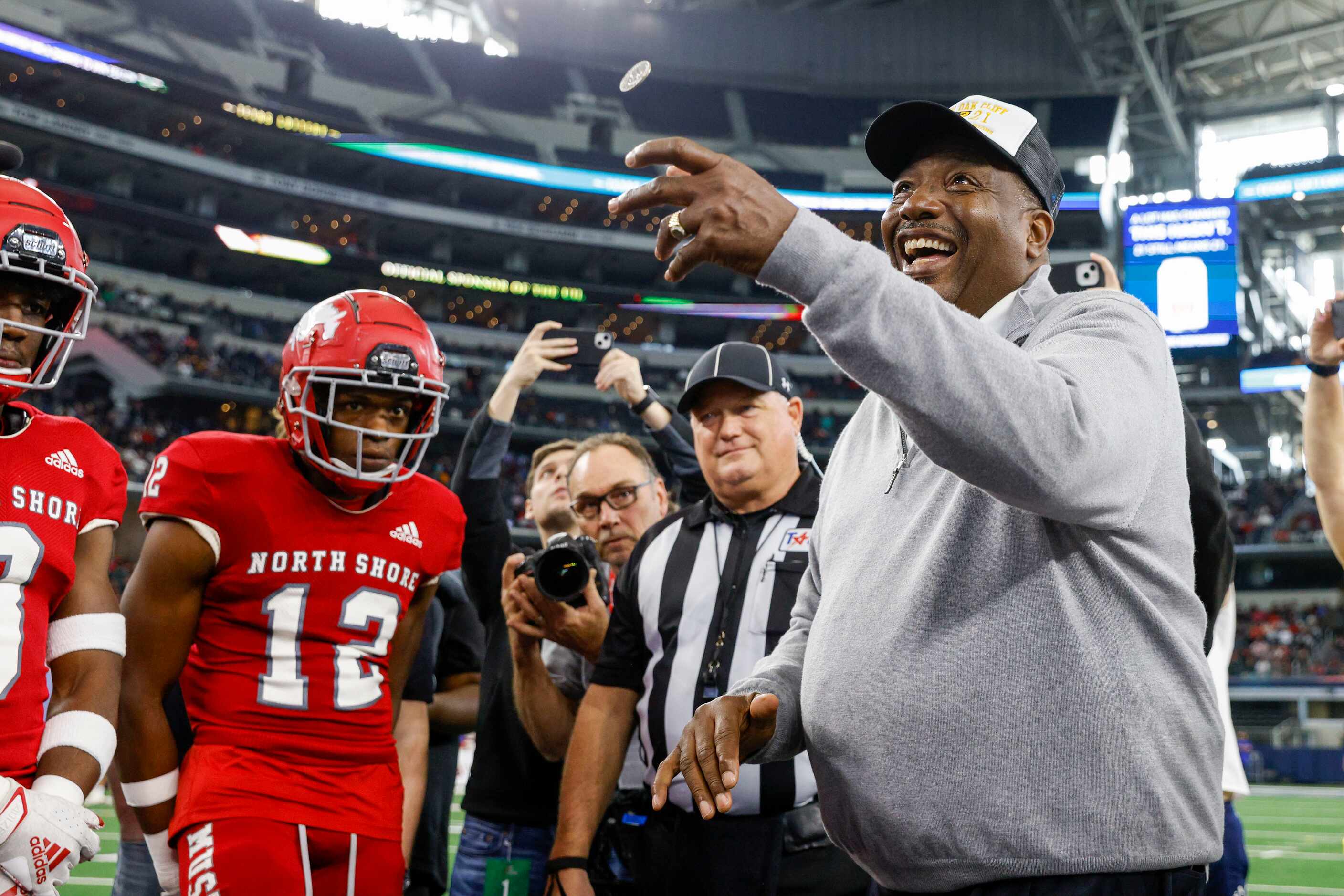 State Sen. Royce West performs the coin toss before the Class 6A Division I state...