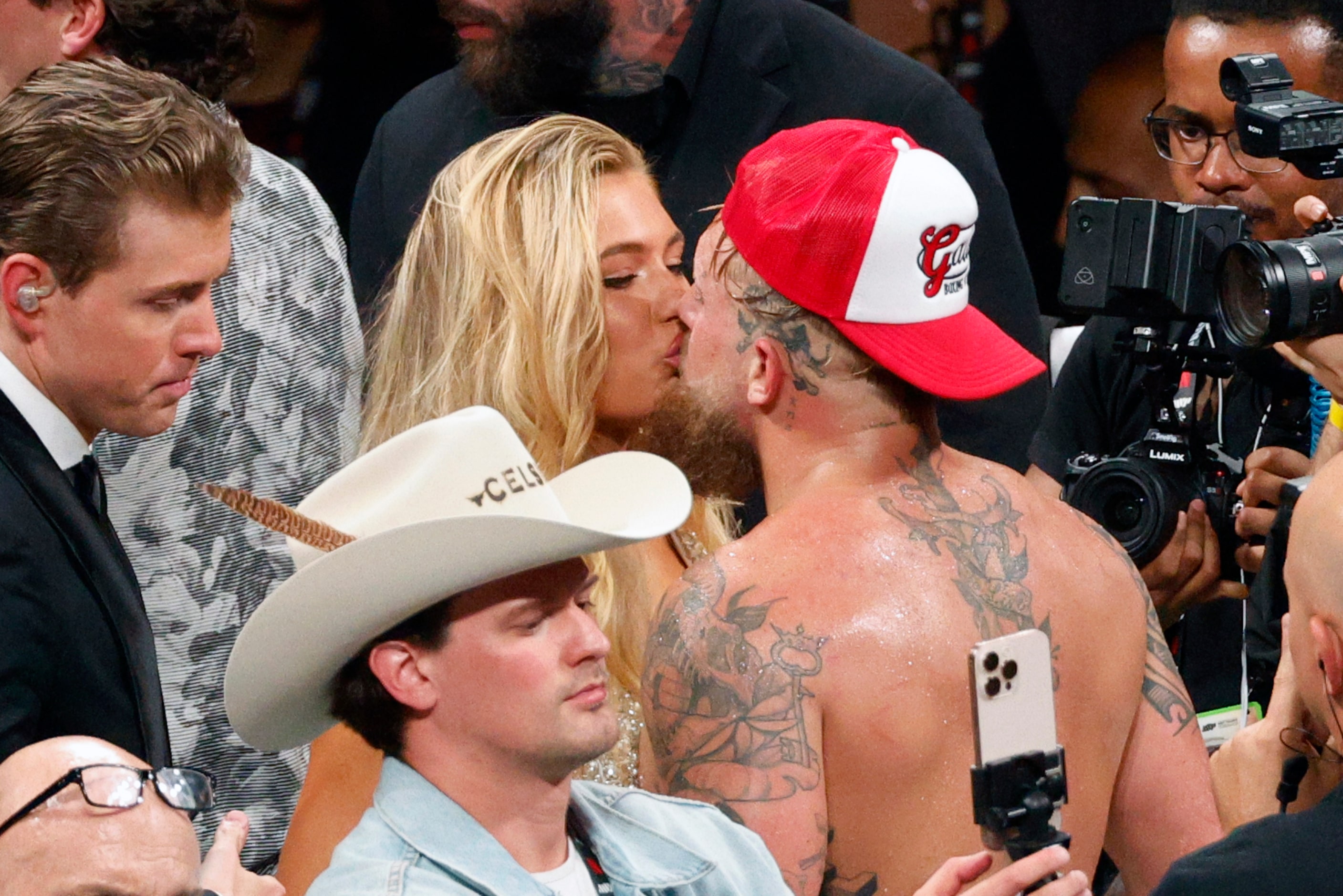 Jake Paul kisses his girlfriend and Olympic speed skater Jutta Leerdam after a heavyweight...