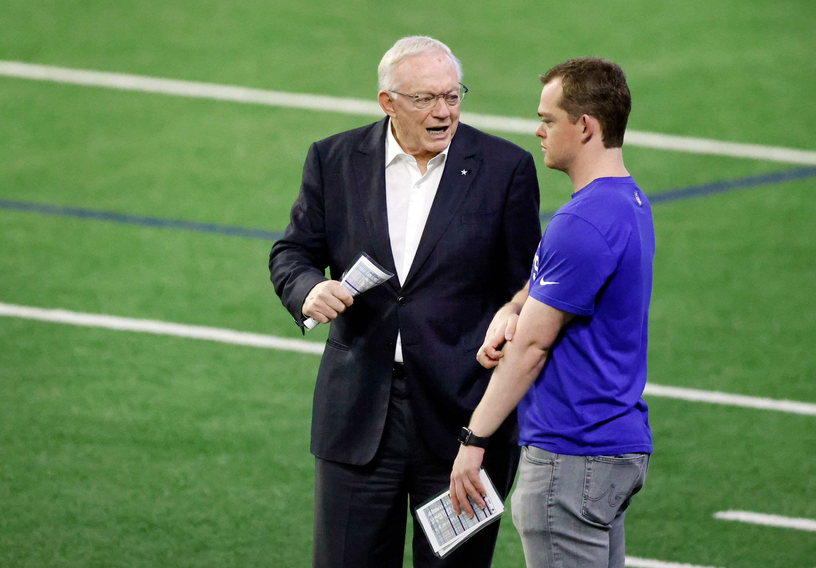 Dallas Cowboys owner Jerry Jones visits with his grandson Shybo Anderson during a mini camp...