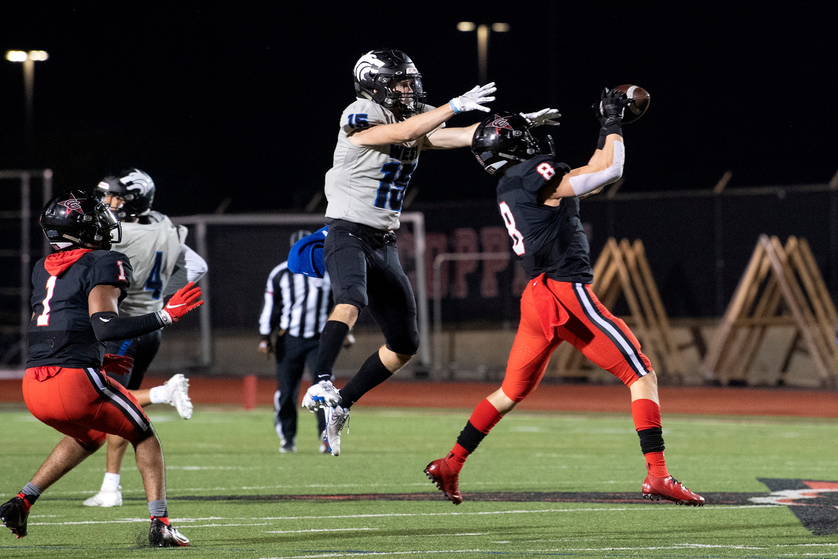 Senior defensive back Canon Peters (8) makes the game-sealing interception on a pass...