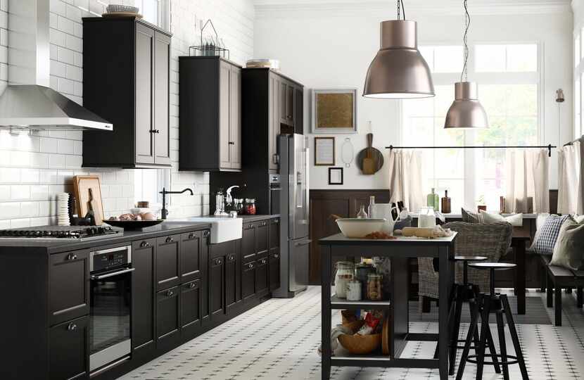 Ikea uses metallic lighting  and stove fixtures as well as light-color floor and wall tiles...