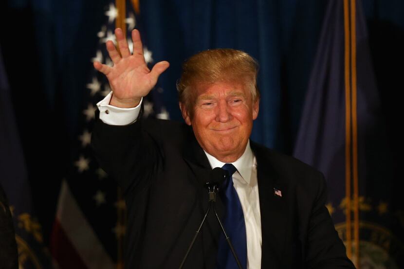  MANCHESTER, NH - FEBRUARY 09: Republican presidential candidate Donald Trump waves to his...