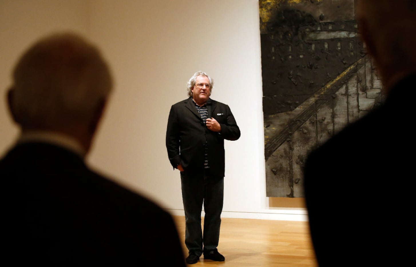 Artist  Donald Sultan talks to attendees at his exhibit at the Modern Art Museum of  Fort...