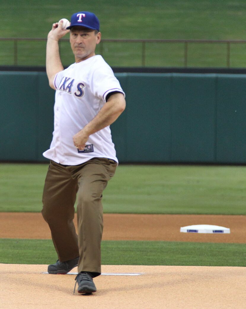 United States Supreme Court Justice Samuel Alito throws out the ceremonial first pitch...