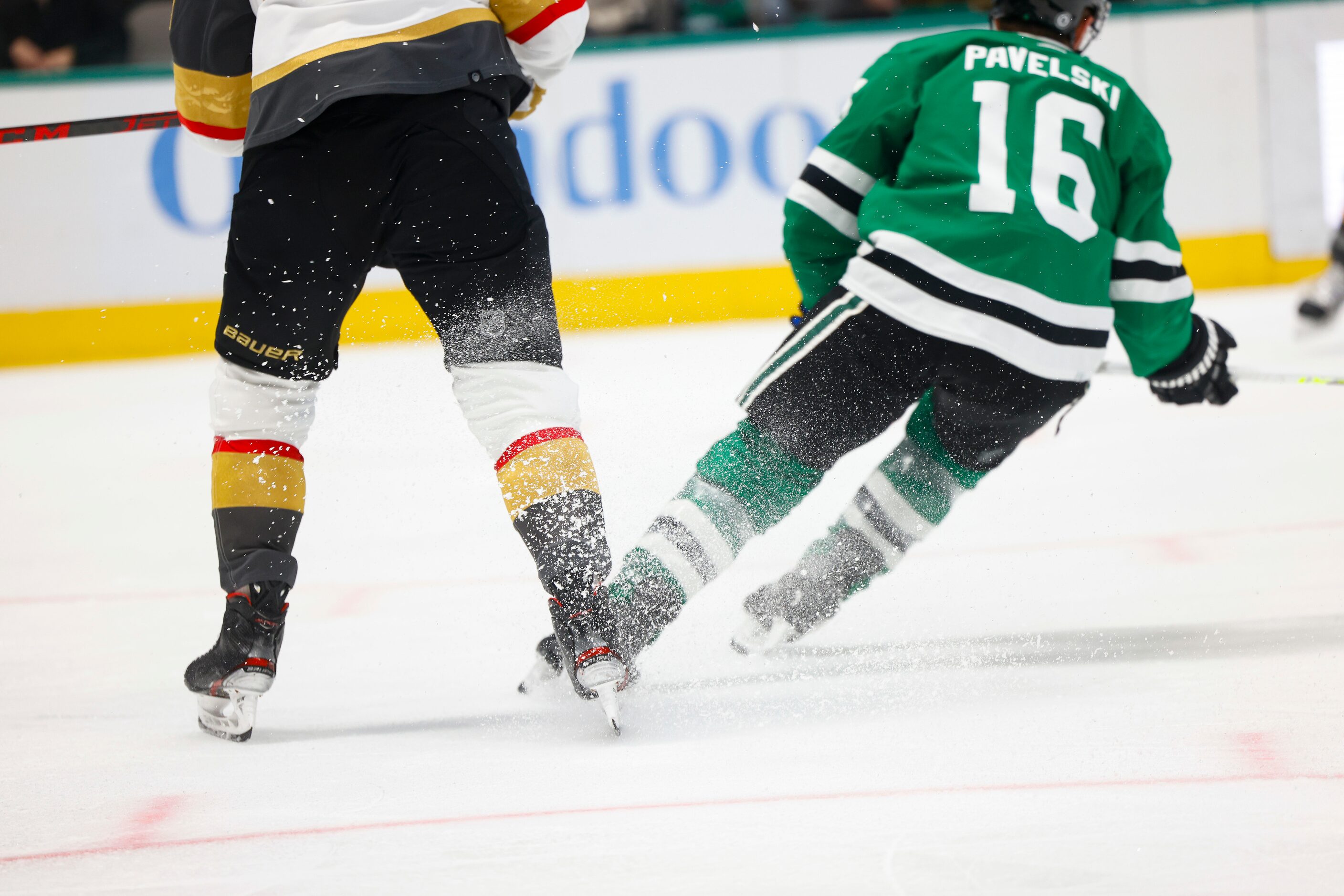 Dallas Stars center Joe Pavelski (16) skates past a Vegas Golden Knights player during the...