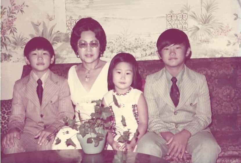 A family photo of my grandma with her three children. From left to right, my dad Jerry, his...