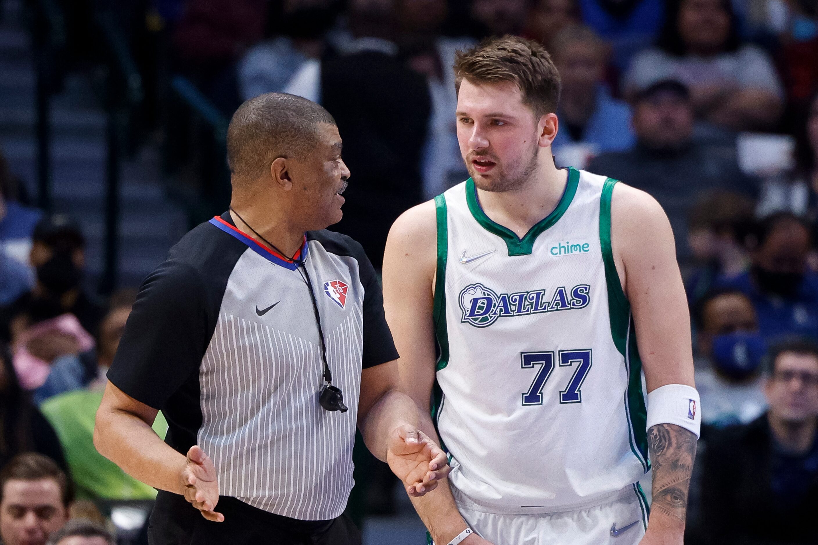 Dallas Mavericks guard Luka Doncic (77) talks with referee Tony Brothers during the second...