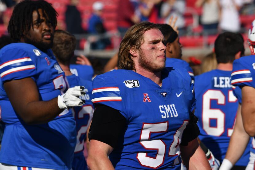 Gerrit Choate looks on during an SMU football game.