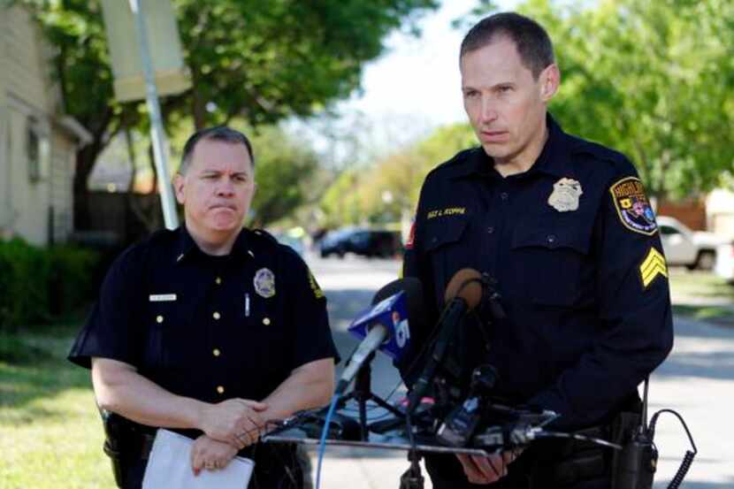 
Highland Park police Sgt. Lance Koppa (right), with Dallas police Lt. Max Geron, gave...