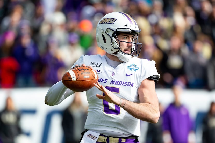 James Madison quarterback Ben DiNucci (6) looks to pass during the second half of the FCS...