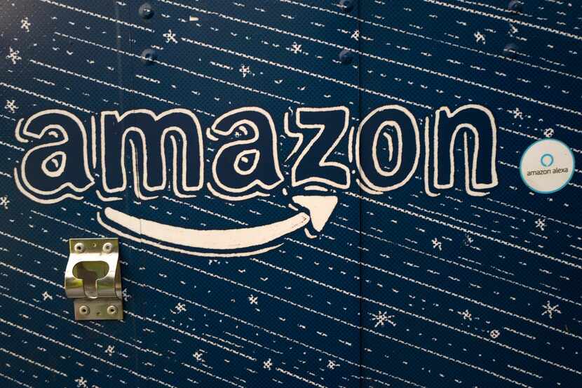 An Amazon logo decorates the side of an Amazon Treasure Truck in Los Angeles, Calif. On Nov....