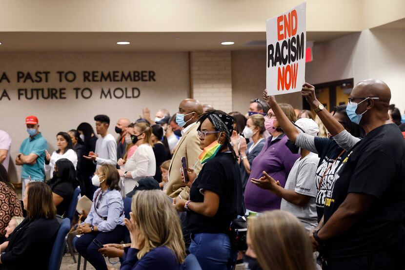 Parents and supporters gathered in the Aledo ISD school board chamber to voice their...
