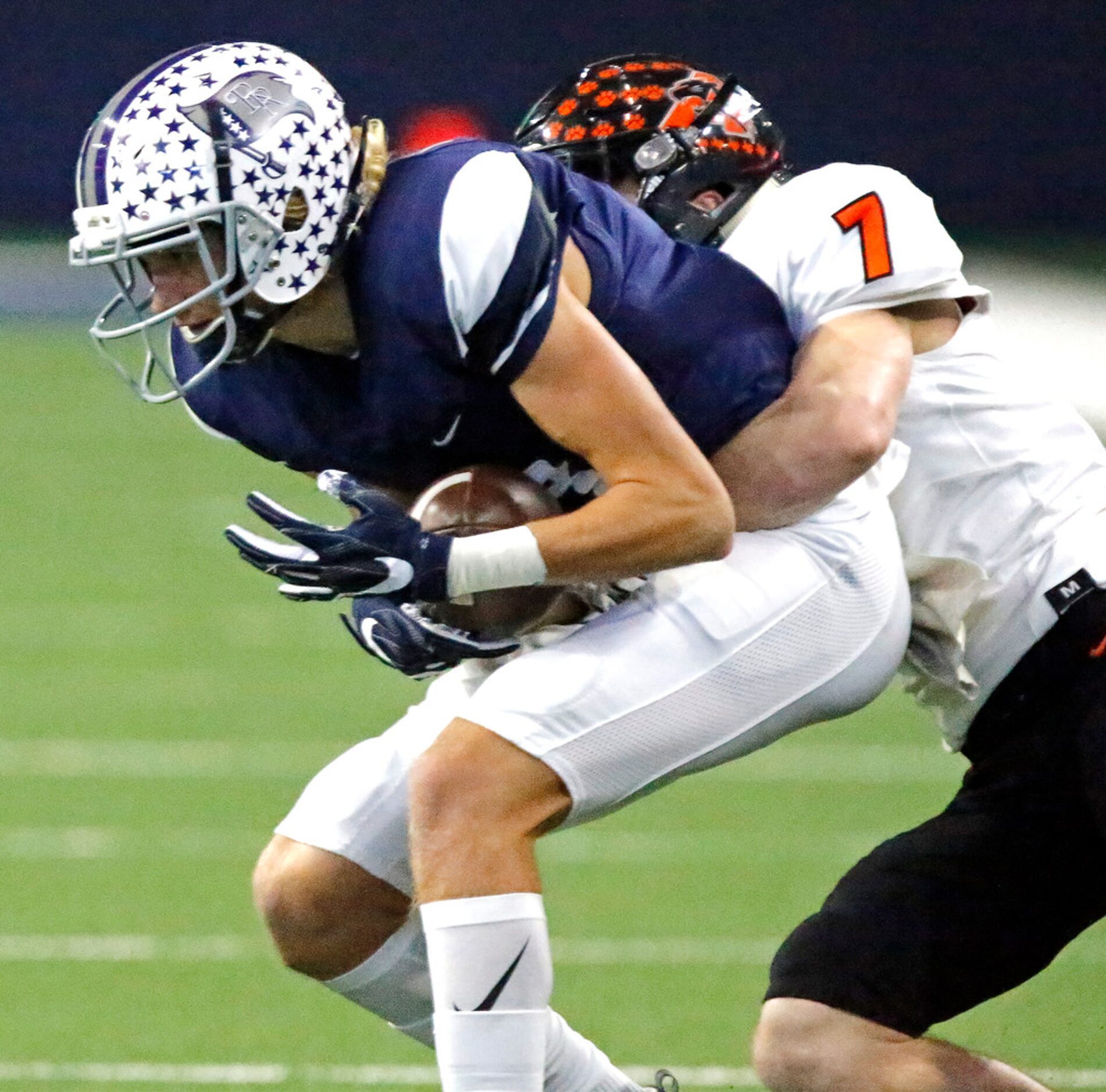 Richland High School wide receiver Gavin Colopy (8) is tackled by Aledo High School...