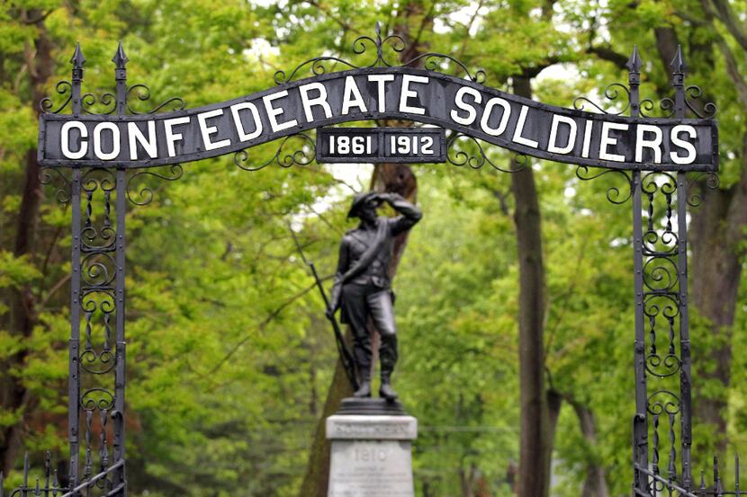 "The Lookout" statue stands guard over 206 headstones of Confederate soldiers inside the...