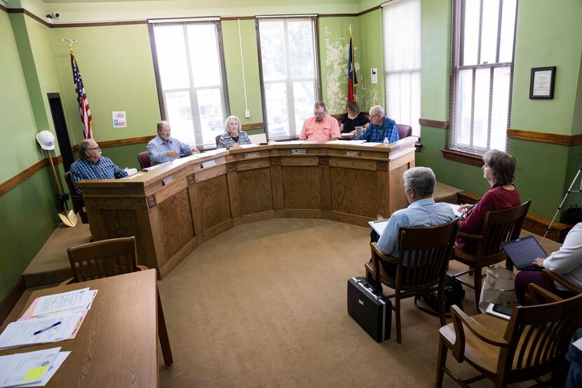 County Judge Linda Grant (center) speaks in favor of writing a letter to ask Texas Parks and...