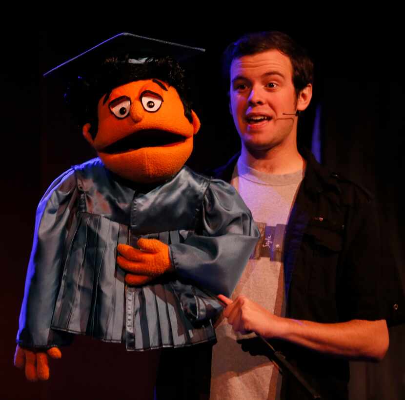 Matt Purvis performs as Princeton during the opening number of Avenue Q on January 11, 2014...