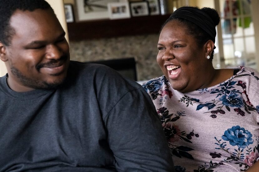 Kerry Parks and his wife, Katrina, laugh together as they talk about some of the lighter...