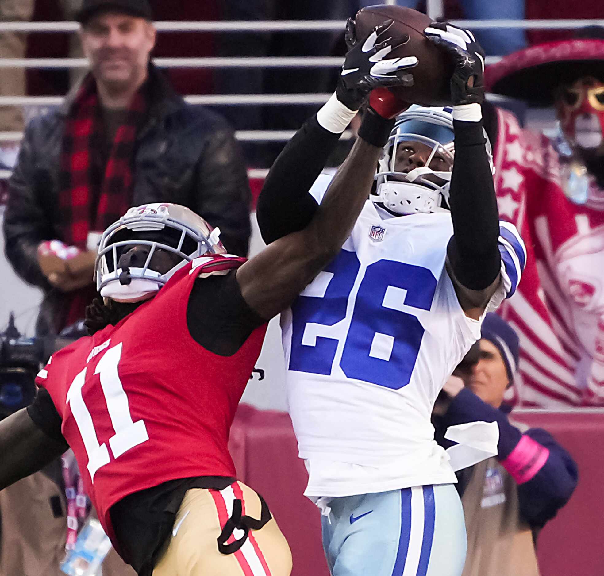 Dallas Cowboys cornerback DaRon Bland (26) breaks up a pass intended for San Francisco 49ers...