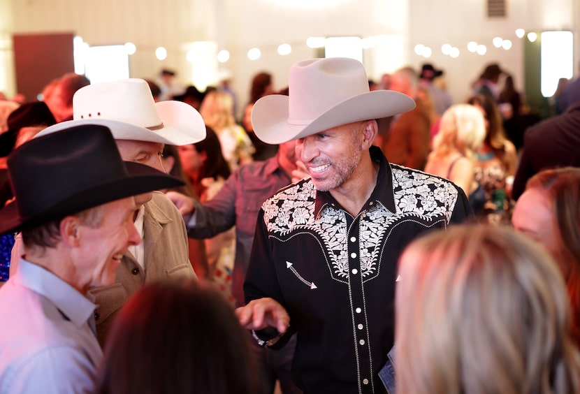 Dallas Mavericks head coach Jason Kidd talks with friends at the Cattle Baron's Ball at...