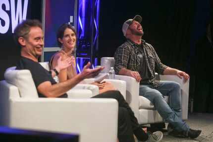 Garth Brooks, right, and the Wall Street Journal's Hannah Karp, center, laugh as Amazon...