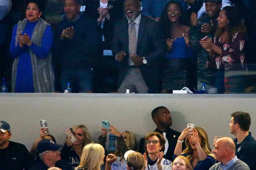 Former Dallas Cowboys Hall of Fame running backs Emmitt Smith (center, right) and Tony...