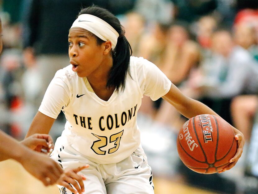 The Colony forward Jewel Spear (23) looks for a pass outlet during the second half as The...