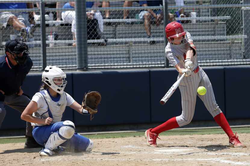 Flower Mound Marcus High School player #3, Haidyn Sokoloski, gets a hit during a softball...