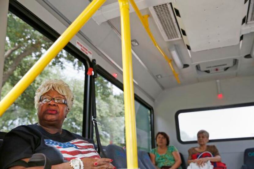 
Jackie Hilliard of McKinney rides a bus on the McKinney blue line, one of two fixed routes...