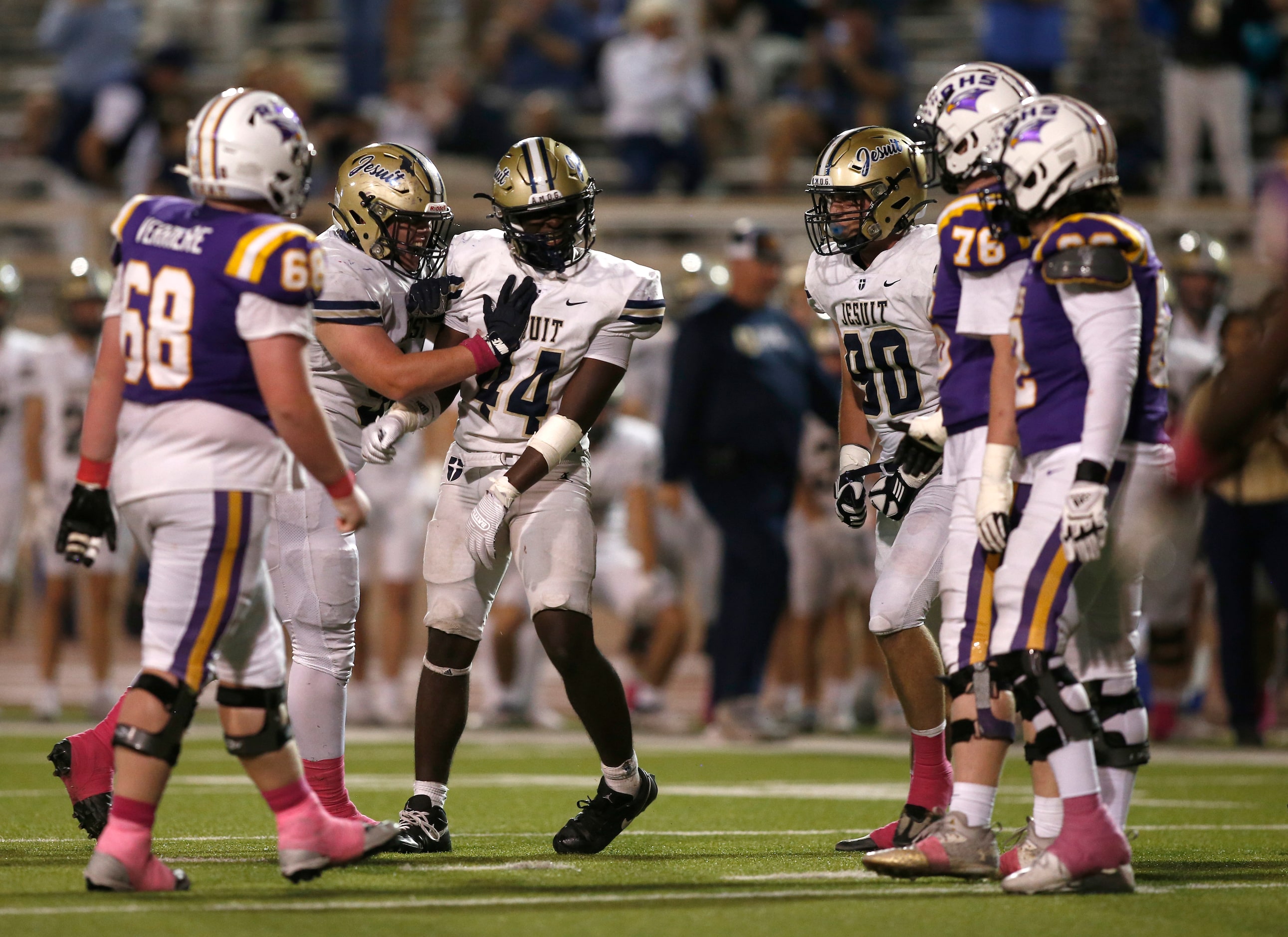 Jesuit linebacker Gabriel James (44) celebrates with a teammate after sacking the Richardson...