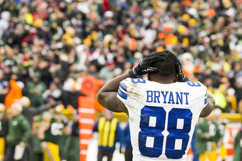 Dallas Cowboys wide receiver Dez Bryant reacts after his apparent reception was reversed on...