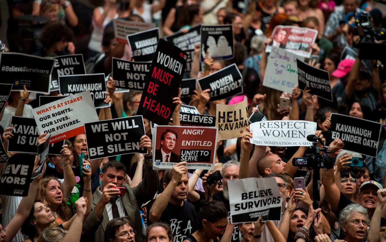 TOPSHOT - Protesters occupy the Senate Hart building during a rally against Supreme Court...