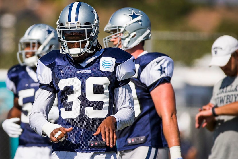 Dallas Cowboys cornerback Brandon Carr (39) practices despite a taped up right hand, that...