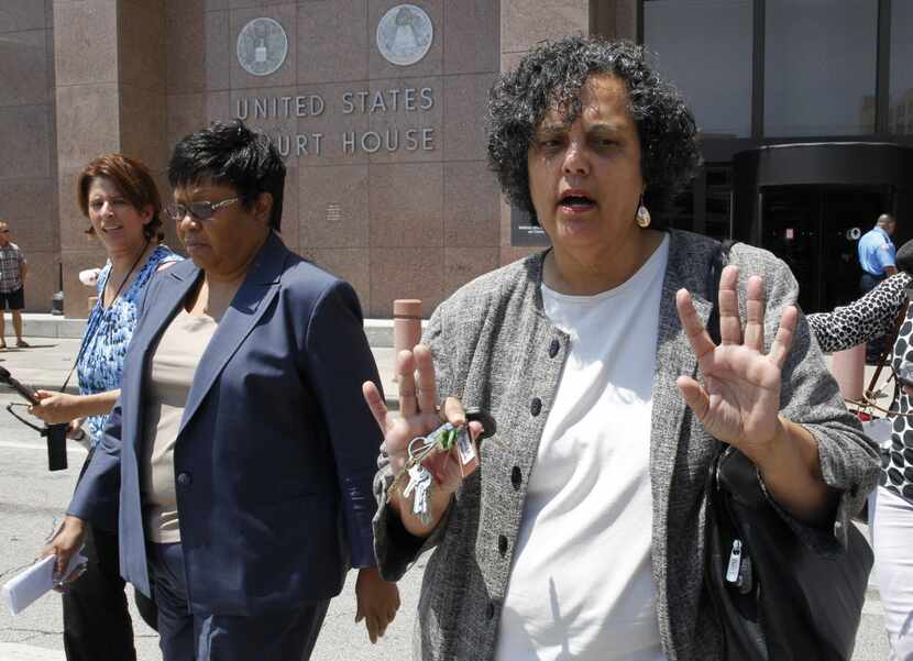 A file photo of Kathy Nealy, left, and her attorney Cheryl Wattley at the Earle Cabell...